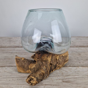 Tropfenvase aus Glas auf Holz (f)