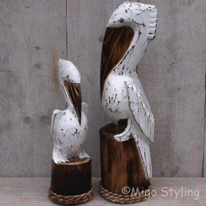 Pelikanen houtsnijwerk