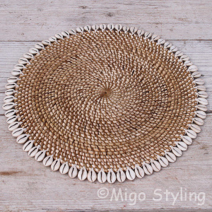 Placemat met kauri schelp