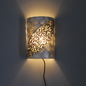 Wandleuchte Muscheldesign dunkel