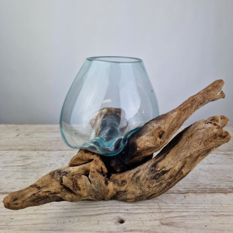 Tropfenvase aus Glas auf Holz (h)