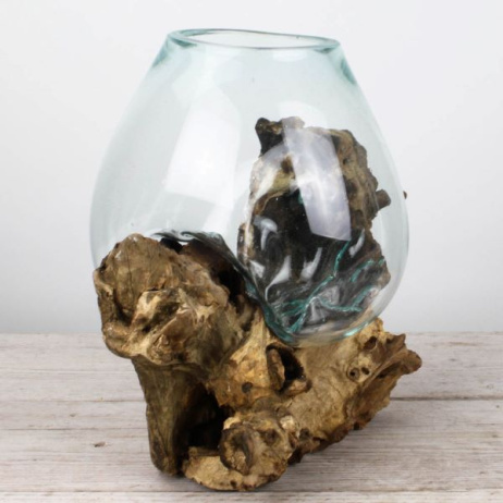 Tropfenvase aus Glas auf Holz (h)