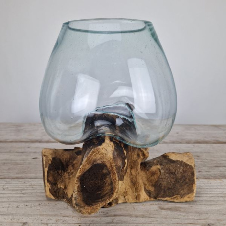 Tropfenvase aus Glas auf Holz (f)