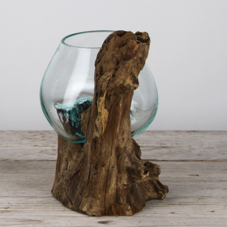 Mini glazen druppelvaas op hout (c)