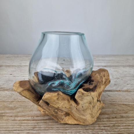 Mini glazen druppelvaas op hout (b)