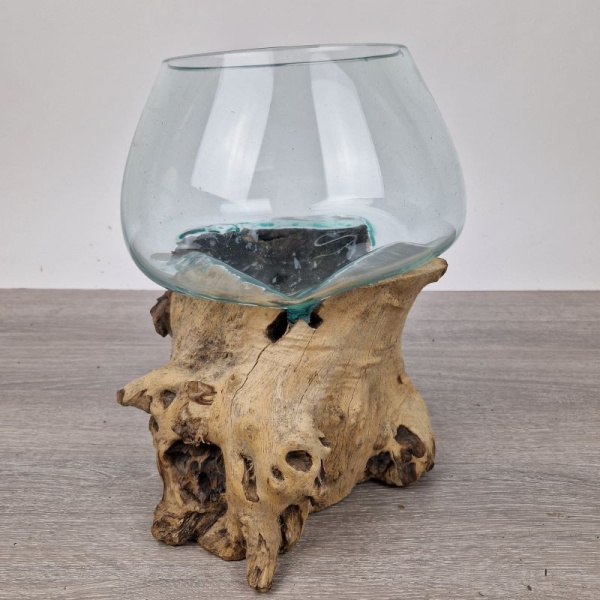 Glazen druppelvaas op hout (h)
