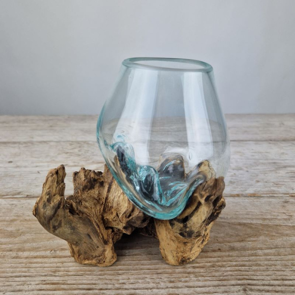 Mini glazen druppelvaas op hout (c)